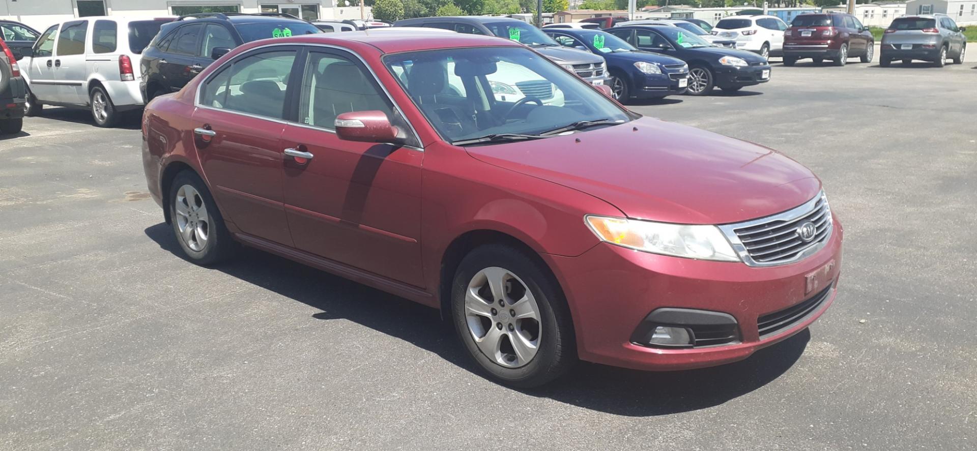 2009 Kia Optima (KNAGE228X95) with an 2.4 4 engine, Automatic transmission, located at 2015 Cambell Street, Rapid City, SD, 57701, (605) 342-8326, 44.066433, -103.191772 - CARFAX AVAILABLE - Photo#5